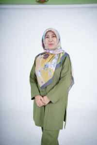 Hj. Husni Dewi Hildwati, S.Pd