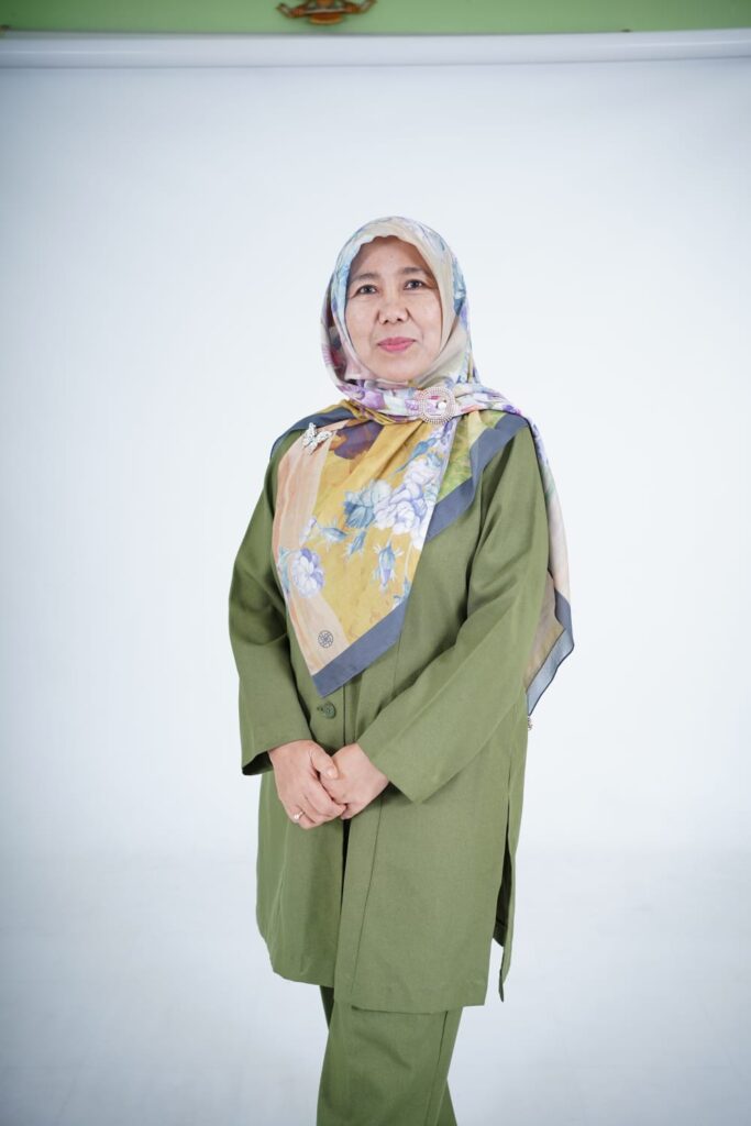 Hj. Husni Dewi Hildwati, S.Pd